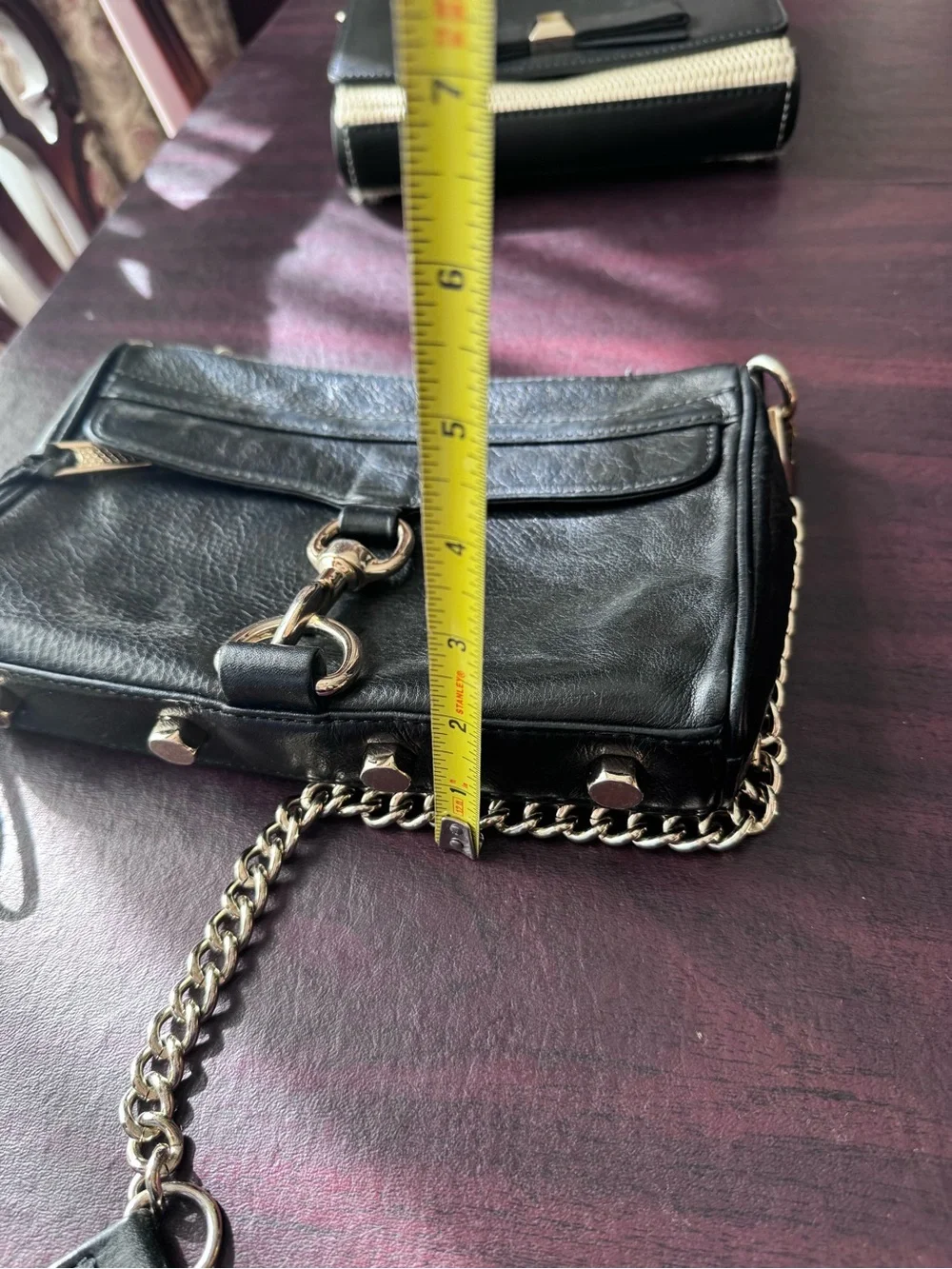 Rebecca Minkoff Mini M.A.C. crossbody bag featuring black Gold tone hardware